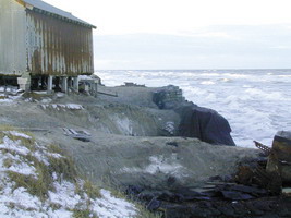 House on shoreline in Shishmaref, Alaska