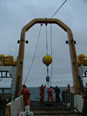 Image of Freeman crew deploying a nitrate sensor.