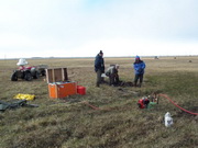 digging hole to monitor permafrost temperatures
