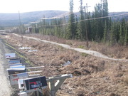 rural road damaged by melting permafrost 