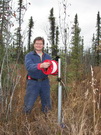 leaning telephone poles due to melting permafrost 