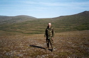 distant 'rolls' formed as slope slides downhill over melting permafrost, creating a series of plateaus 