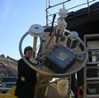 Dave Strausz working on a mooring we call "Peggy" on deck on the Oscar Dyson