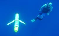 Slocum glider and diver image courtesy of Teledyne Webb Research