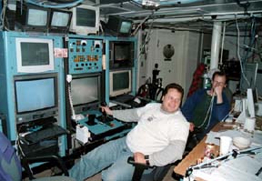 photograph of ROPOS pilots at the control console