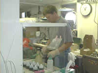image of Geoff Lebon preparing chemicals