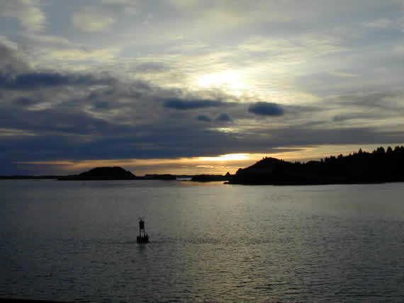 Kodiak Island with a navigation buoy in the foreground