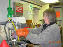 Image of  Kathy preserving a water sample.