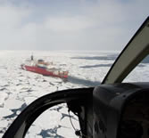 View from helicopter of Healy cutting through ice.