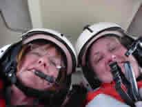 Kathy Mier and Rachael Cartwright in helicopter flying to Healy for Leg 2 of cruise.