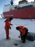 Sampling water under the ice through a core hole