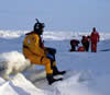 Seaman Mertin, rescue diver, standing by during ice operations.