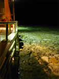 Night view of ice off ship during night work, Station 78
