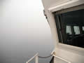 USCGC Healy coming into fog.