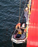 climbing down ladder from Healy to awaiting zodiak