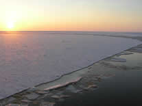 Approaching sunset over an ice-laden Bering Sea