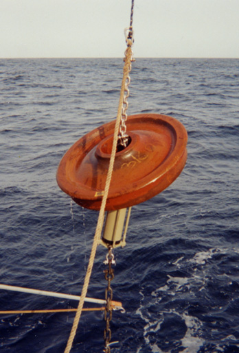 Photo of aberrant train-wheel anchor that moved more than 50m up the mooring chain. It is hanging just above a current meter.