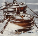 Ship-deck snow on mooring anchors.  Click to return to front page