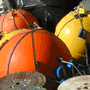 Ship's deck filled with mooring equipment.