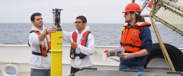 Three men prepare BGC Argo float for deployment on WCOA 2021