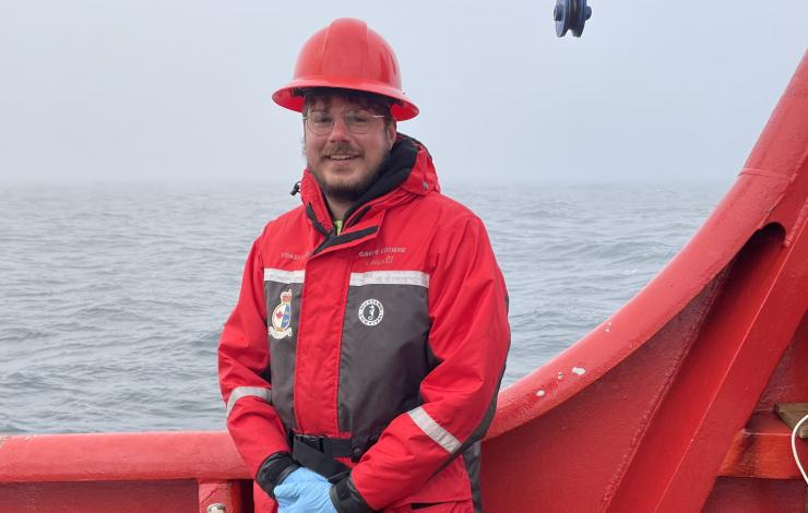 Nick Silverson on the deck of the Sir Wilfrid Laurier Coast Guard Vessel