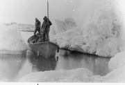Image of crew from the Bear in a small boat