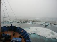  Russian Vessel Khromov picks its way through dirty ice near Herald Island. [Photo: K. Wood] 