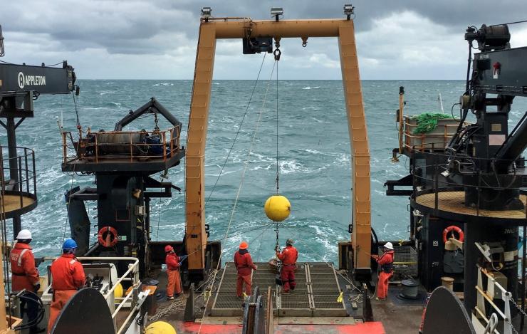 Acoustic Doppler Current Profiler (ADCP) subsurface mooring being deployed off the back of the NOAA Ship Oscar Dyson in the Bering Sea. 