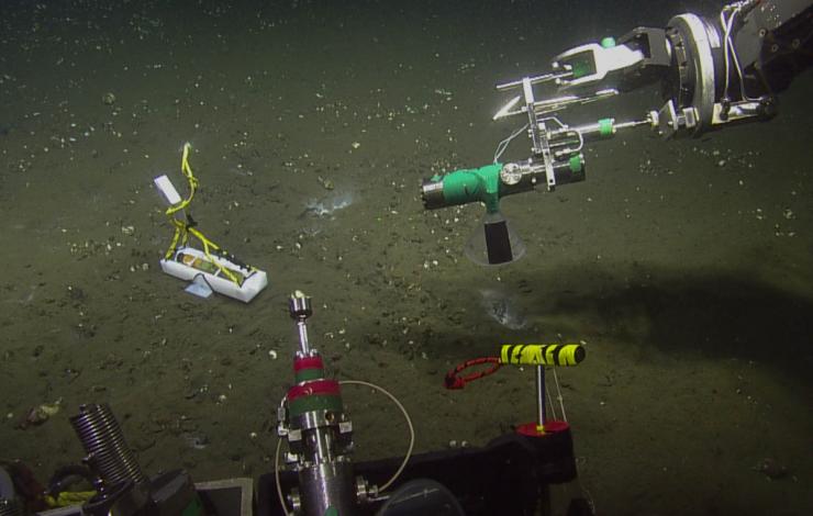 A hydrophone is placed on the ocean floor to record the sound of bubbles. 