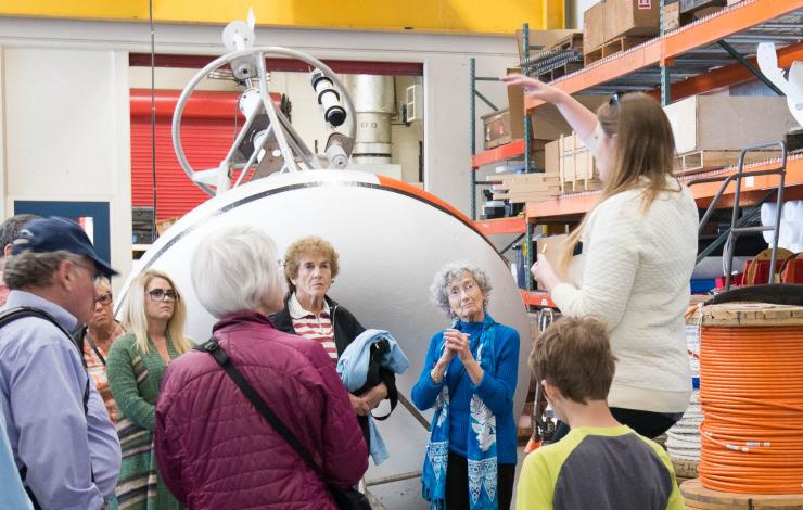 Tour group learning more about moored buoys at the 2017 Open House. 