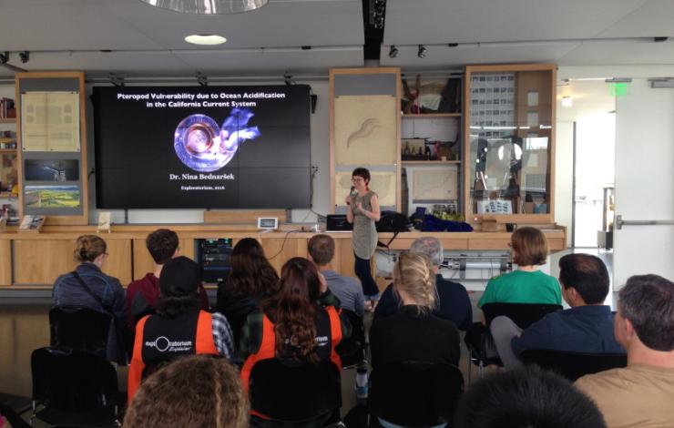 Nina Bednarsek presenting at the Exploratorium during the West Coast Ocean Acidification Cruise in 2016