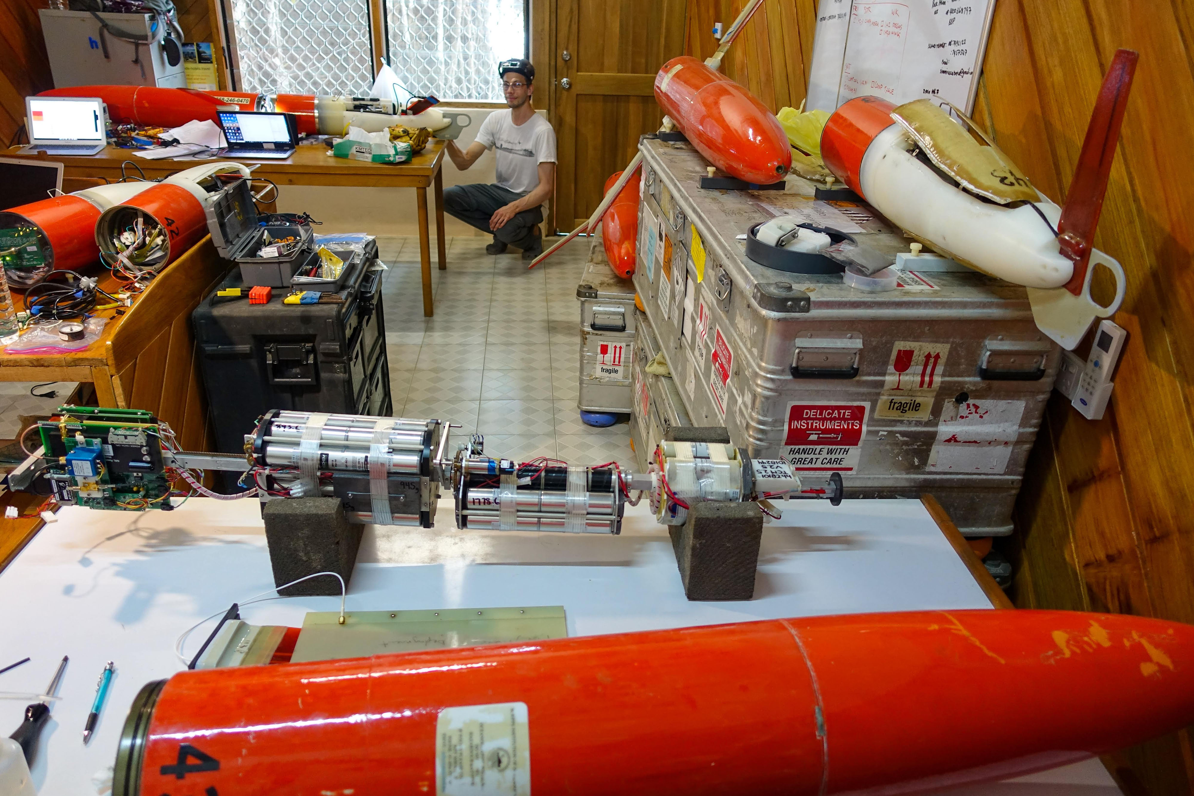 Four gliders in various stages of assembly