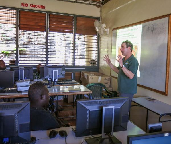 Researcher lecturing in a classroom at the Solomon Islands Teacher's College