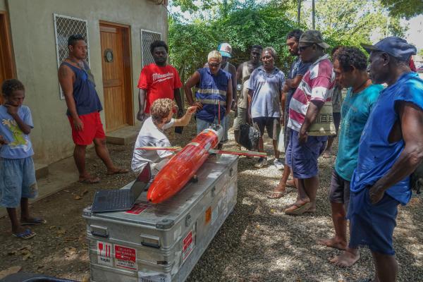 Explaining glider testing to residents