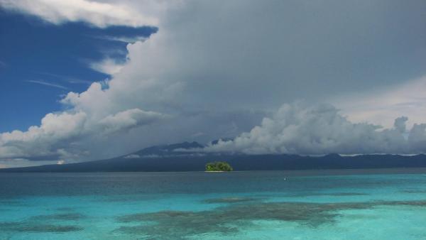 View of sea and sky over Kolombangara Volcano, Solomon Islands