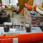 Four gliders in various stages of assembly