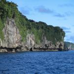 Lifted coral rock cliffs undercut by wave action